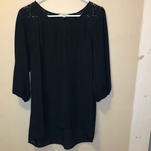 Sheer black dress with lace detailing